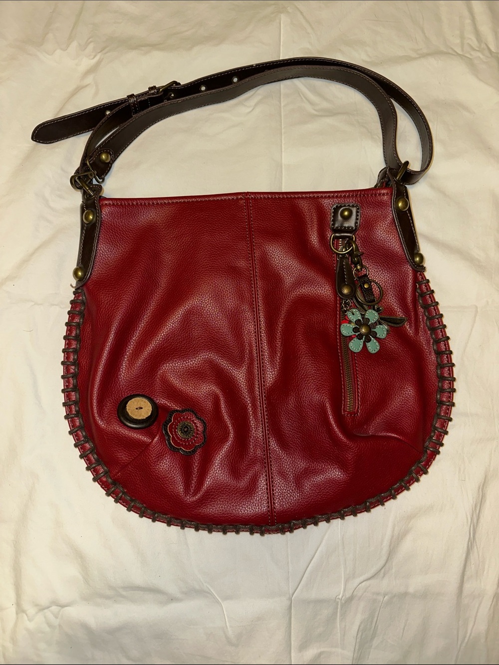 Chala Red Shoulder Bag with Brown Trim and Floral Charm